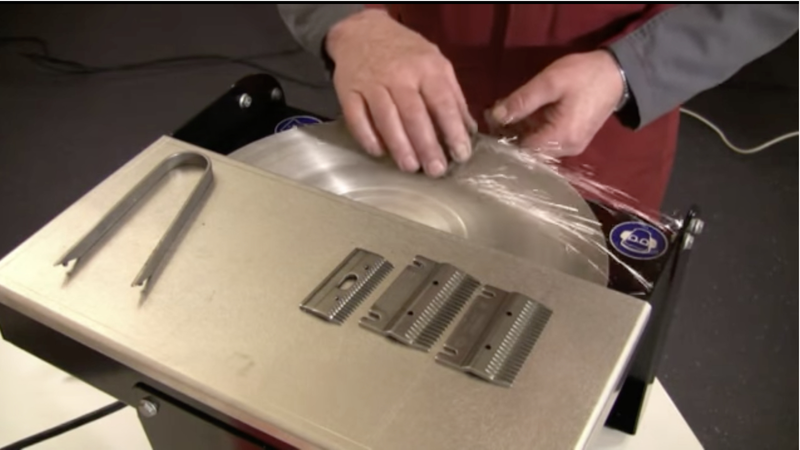 Clipper blade sharpening on The Heineger Machine